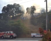 Fire in forest near house