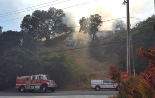 Fire in forest near house